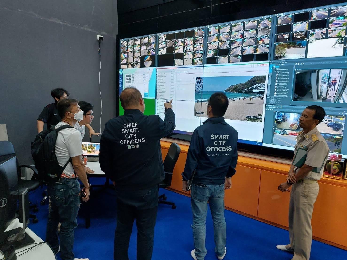 Rawai, Phuket: smart city officers in front of a CCTV wall